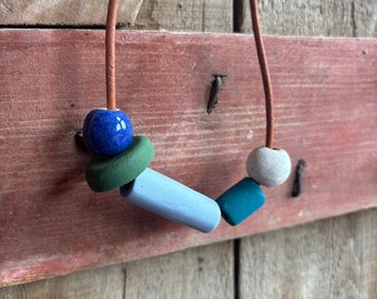 Leather necklace with handmade ceramic beads