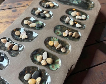 Nature inspired mancala