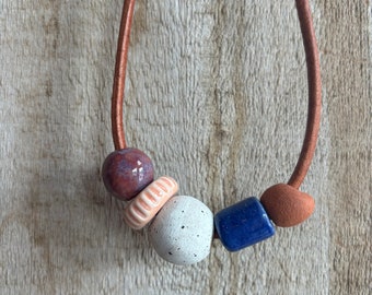 Leather necklace with handmade ceramic beads