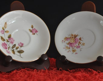 Pair of Similar unmatched Floral Pattern Saucers - 15cm Diameter