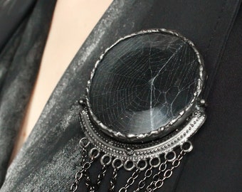 Real spiderweb brooch