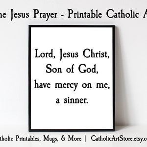 May include: Printable Catholic art print with black text on a white background. The text reads "The Jesus Prayer - Printable Catholic Art" and "Lord, Jesus Christ, Son of God, have mercy on me, a sinner."