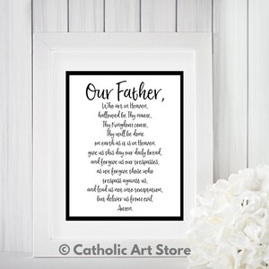 May include: A black and white printable wall art print with the text "Our Father, Who art in Heaven, hallowed be Thy name, Thy Kingdom come, Thy will be done on earth as it is in Heaven, give us this day our daily bread and forgive us our trespasses, as we forgive those who trespass against us, and lead us not into temptation, but deliver us from evil Amen." The print is framed in a white frame and has a black border.