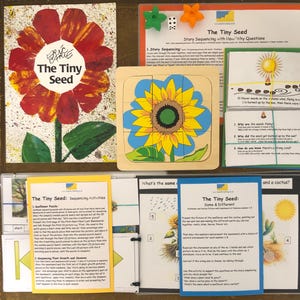May include: A set of educational materials for children about the life cycle of a sunflower. The set includes a book, a puzzle, and several cards with questions and activities. The book is titled "The Tiny Seed" and features a red flower with green leaves. The puzzle is a wooden sunflower with yellow petals and a brown center. The cards are colorful and feature illustrations of sunflowers, seeds, and the sun.