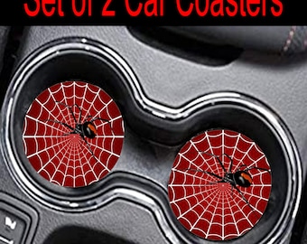 May include: Set of two car coasters featuring a black spider on a red and white spiderweb design.
