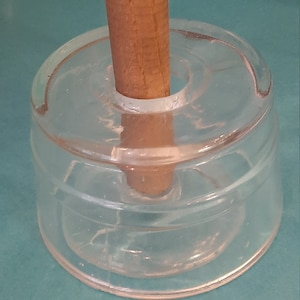 Glass and wood butter mold from the 1940s