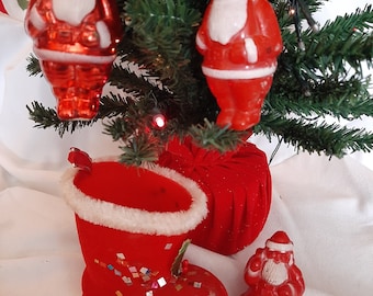 flocked boot and 3 plastic santas