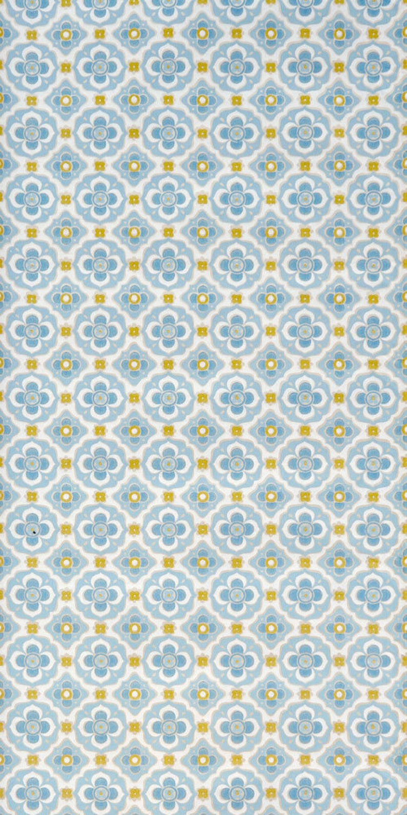 May include: A seamless pattern featuring a repeating design of blue and yellow flowers on a white background.