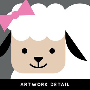 May include: A white sheep with a pink bow on its head. The sheep has black ears and a brown face with black eyes and a small black nose.