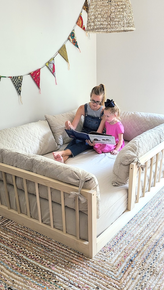 twin bed with rails all around