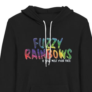 May include: Black hooded sweatshirt with a rainbow graphic that says "Fuzzy Rainbows It Will Melt Your Face"