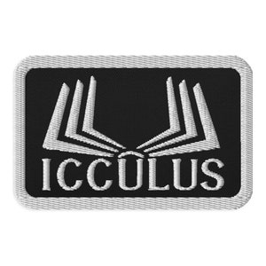 May include: A black and white embroidered patch with a stylized design and the word "ICCULUS" in white lettering.