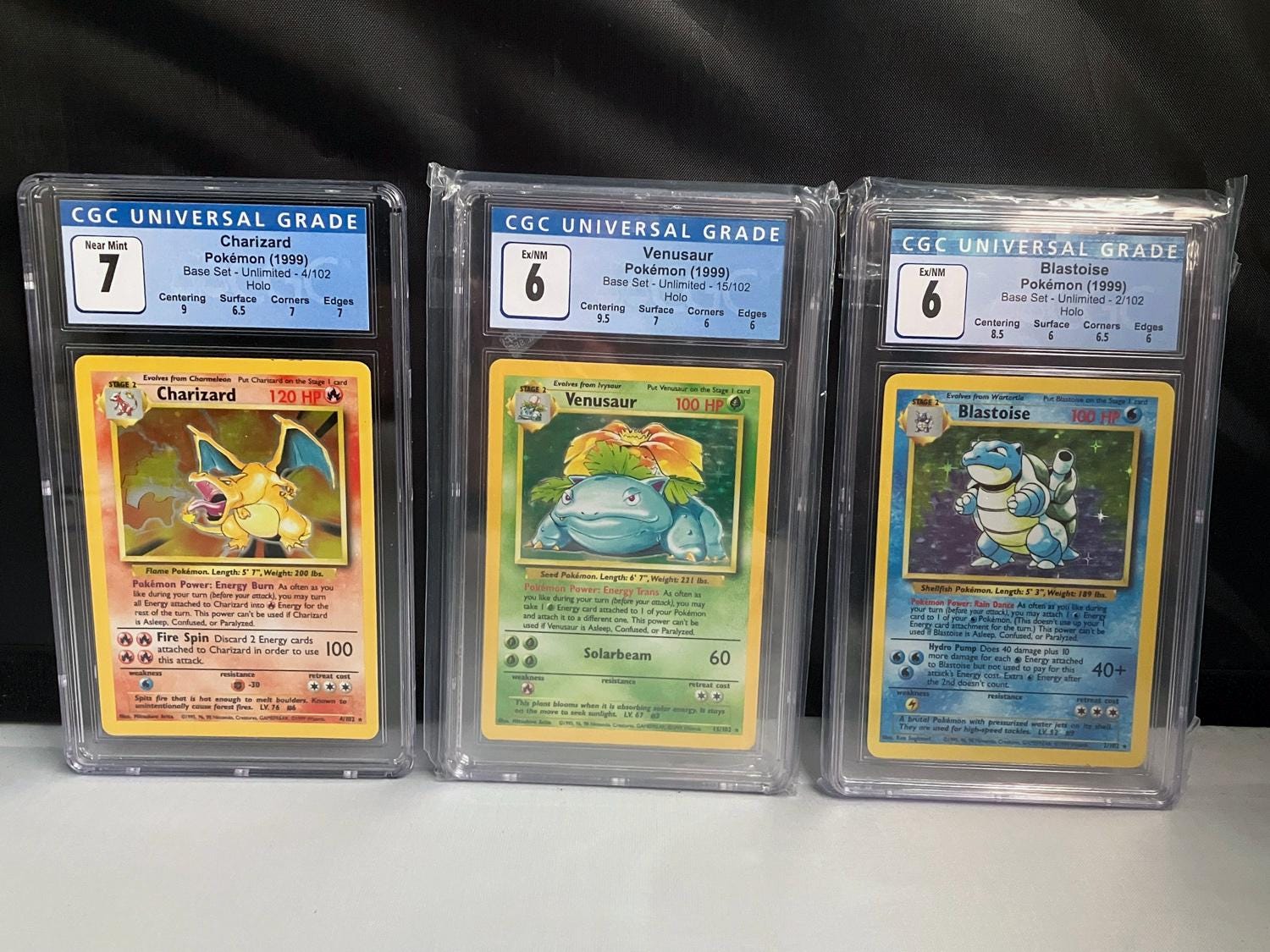Charizard Blastoise Venusaur CGC 7/6/6 WOTC 1999 Pokemon Base Set
