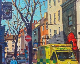 May include: An oil painting of a city street scene featuring a bright yellow ambulance parked on the right side. A person in a blue jacket stands on the sidewalk near a bare tree, while a small cat walks nearby. Buildings line the street under a blue sky.