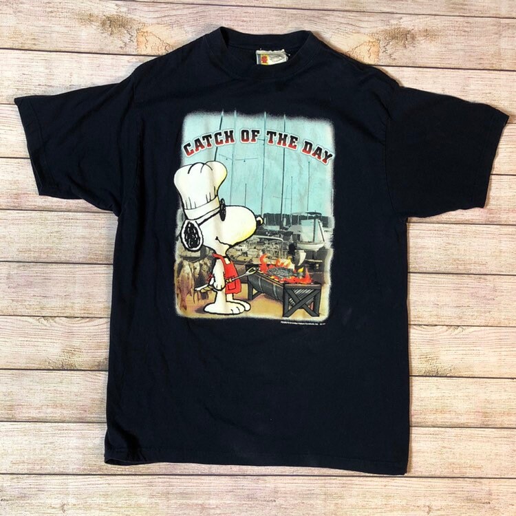 Vintage Peanuts Snoopy 'Catch Of The Day' T-shirt made by Peanuts - Charlie Brown