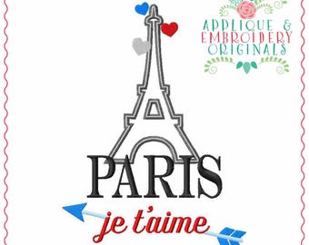 Puede incluir: Diseño de bordado con un contorno en blanco y negro de la Torre Eiffel con la palabra "PARIS" en texto negro y la frase "je t'aime" en texto rojo con una flecha azul.