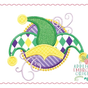 May include: A green, yellow and purple jester hat with a diamond pattern. The hat is decorated with gold beads and swirls. The text "Applique & Embroidery Originals" is in the bottom right corner of the image.