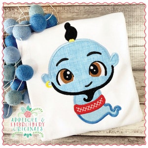 May include: Embroidered design of a blue genie with a red and white striped sash, brown eyes, and a black goatee. The genie is in a flying pose with a whimsical expression.