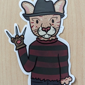 Fearsome Freddy Krueger "Cougar" Cat Sticker – Unique Horror-Themed Cartoon Decal for Horror Fans!