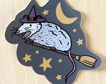 Whimsical Witchy Possum Waterproof Sticker - Adorable Possum Dressed as a Witch on a Magical Broomstick, Illustrated Decal with Gold Stars