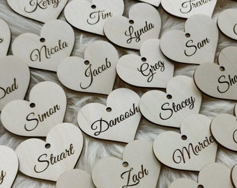 Personalized wooden heart place cards wedding favors. Wedding name tags place cards, L17