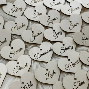 Personalized wooden heart place cards wedding favors. Wedding name tags place cards, L17