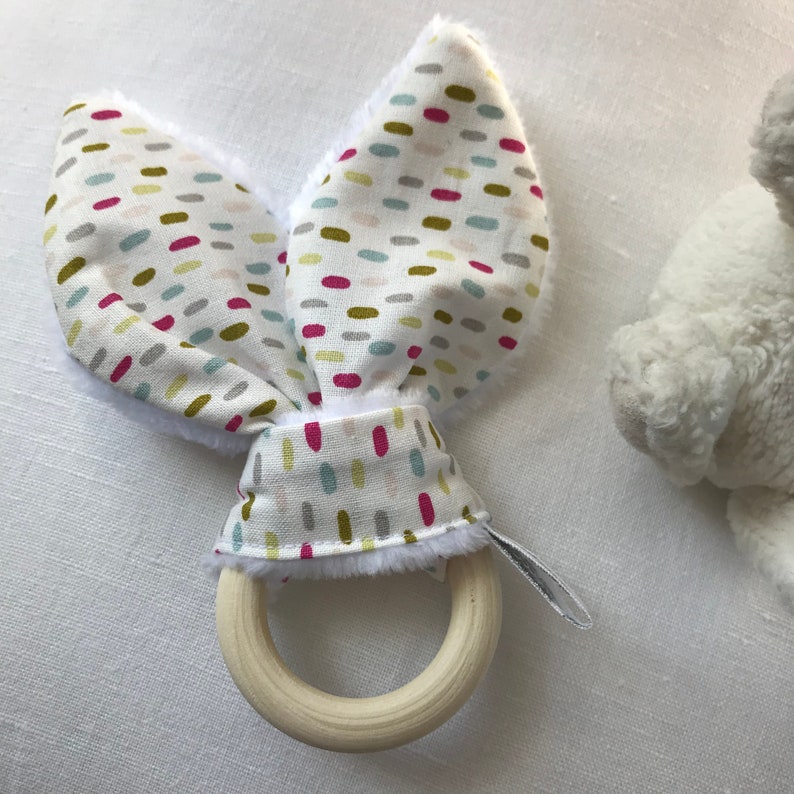 Rabbit ear rattle fabric with bells, wooden teething ring, gripping rattle pattern small multicolored strokes image 1