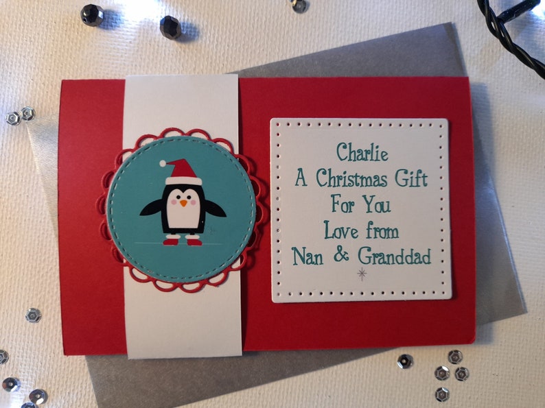 Personalised Christmas money gift wallet with cute penguin for vouchers and cash presents for children grandchildren baby boys and girls Personalised Christmas money gift wallet with cute penguin for vouchers and cash presents for children grandchildren baby boys and girls
