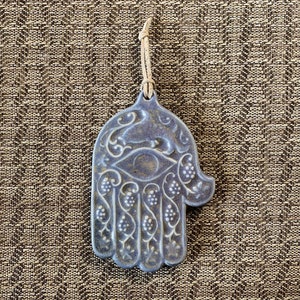 Hamsa. Hamsa wall decor. Home blessing. Hamsa Art. Hamsa Emulate. Evil eye protection art. Ceramic Hamsa with an eye and fish. Israeli art.