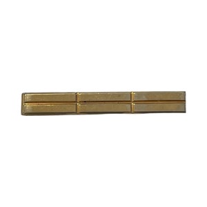 May include: A gold-toned tie bar with a simple, rectangular design. The bar has a polished finish and a subtle, textured surface.
