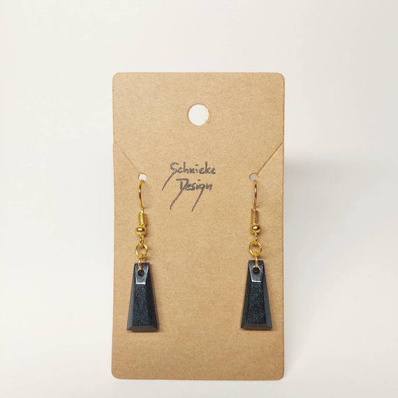 Earrings made of epoxy resin in metallic black