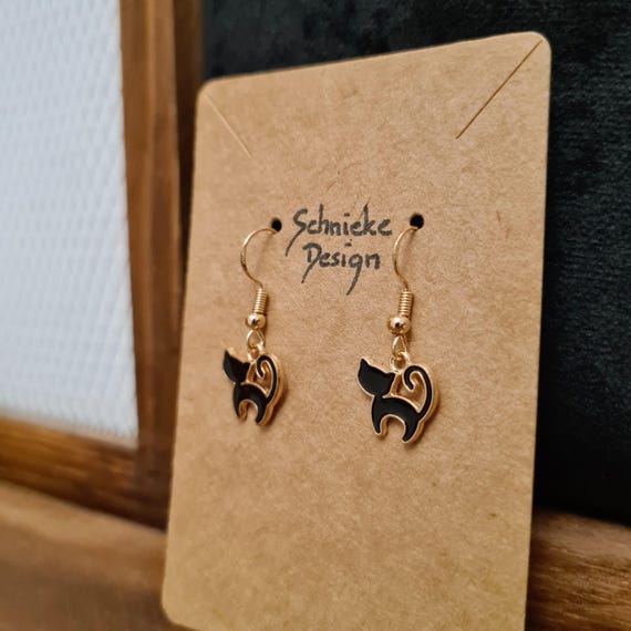 Earrings with small enamel cats