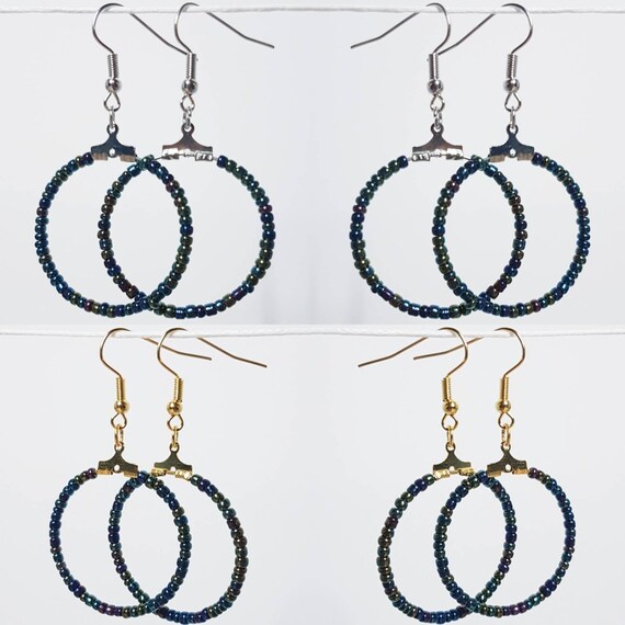 Earrings (gold/silver) with dark, metallic shimmering beaded creoles