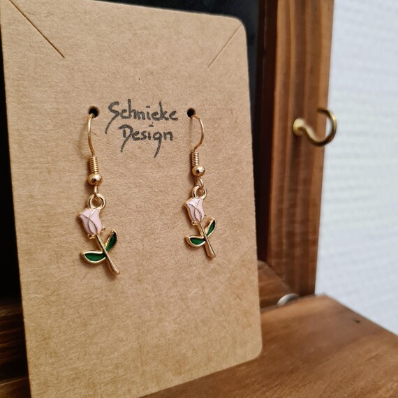 Earrings with roses made of enamel