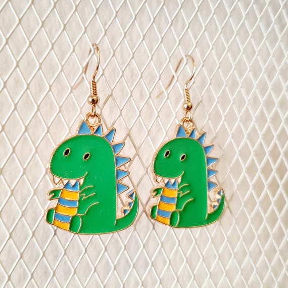Earrings with dinosaurs made of enamel