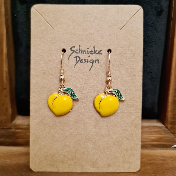 Earrings with plums made of enamel
