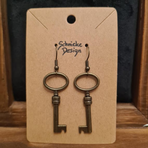 Earrings with small keys in antique bronze
