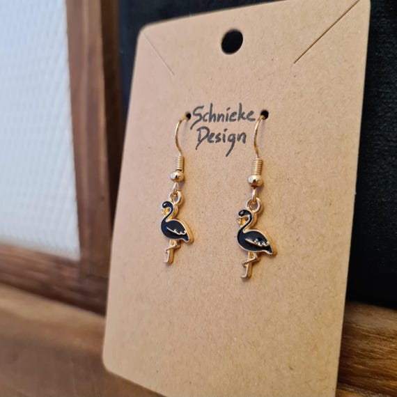 Earrings with black enamel flamingos
