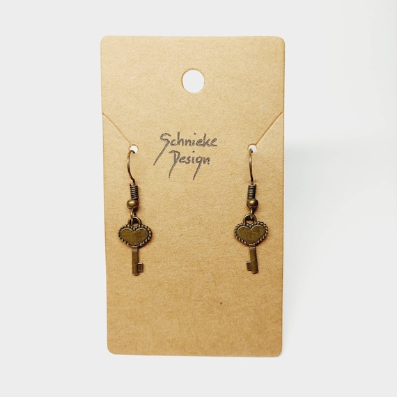Earrings in bronze with mini key