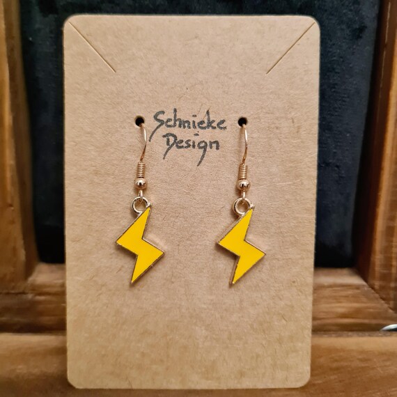 Earrings with lightning bolts made of enamel