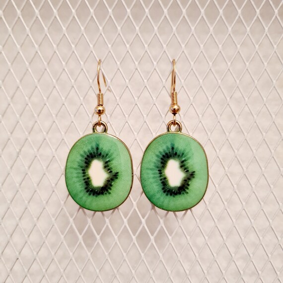 Earrings with green kiwis made of enamel