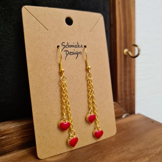 Earrings with small hearts on gold chains - long