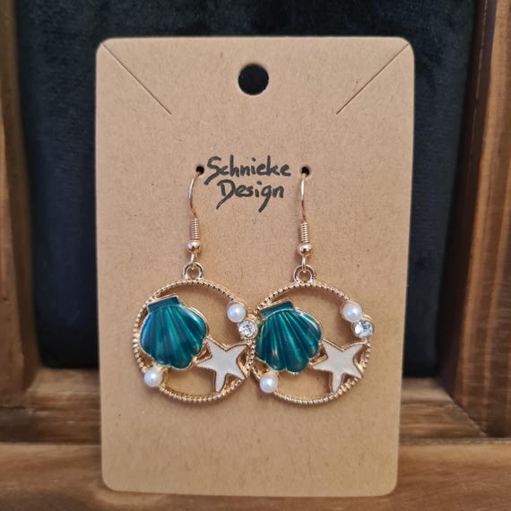 Earrings with shell and starfish made of enamel
