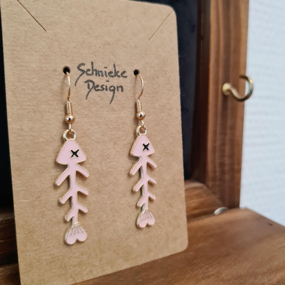 Earrings with enamel fish skeletons