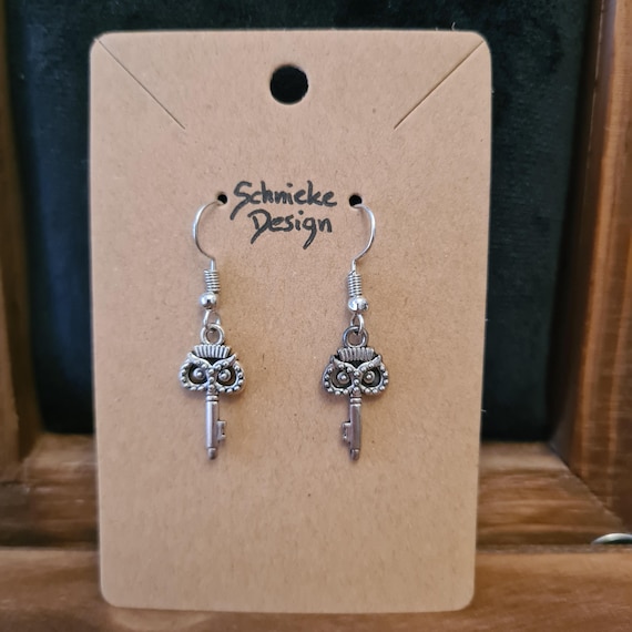 Earrings with owl keys in silver