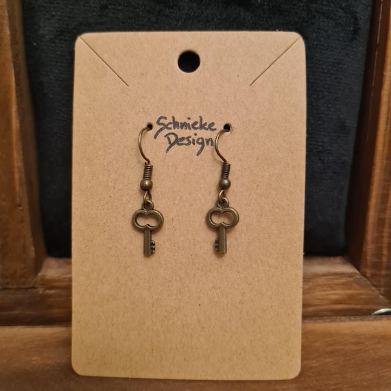 Earrings in bronze with mini key