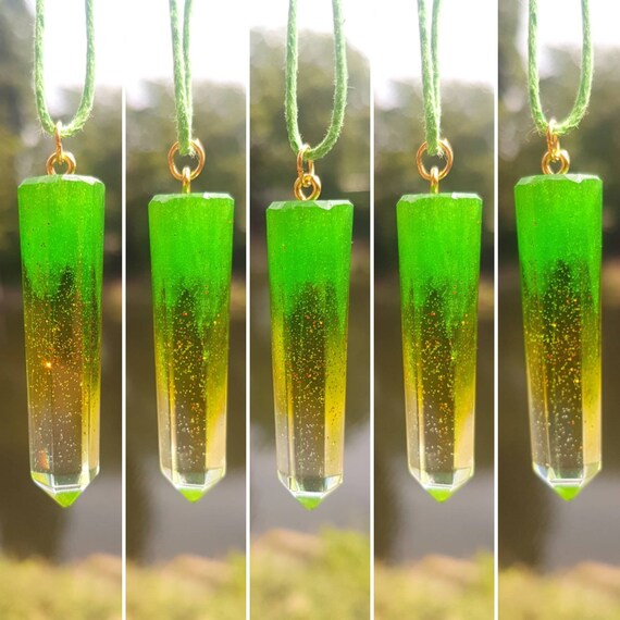 Necklace with handmade pendant made of epoxy resin - metallic green and copper-colored glitter particles in transparent epoxy - shape stalactite