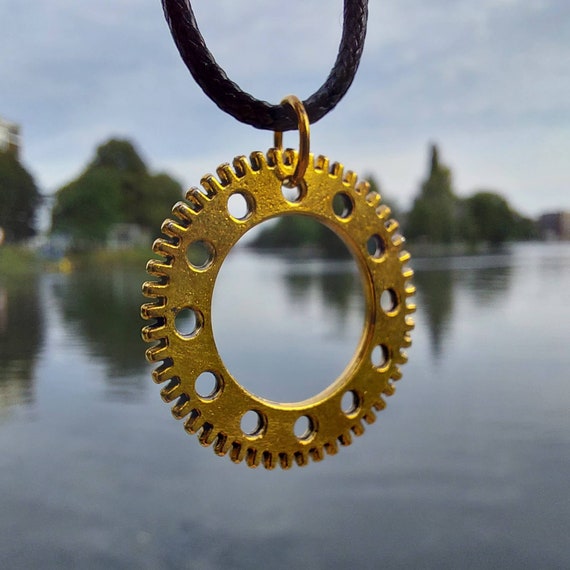 Black chain with golden gear