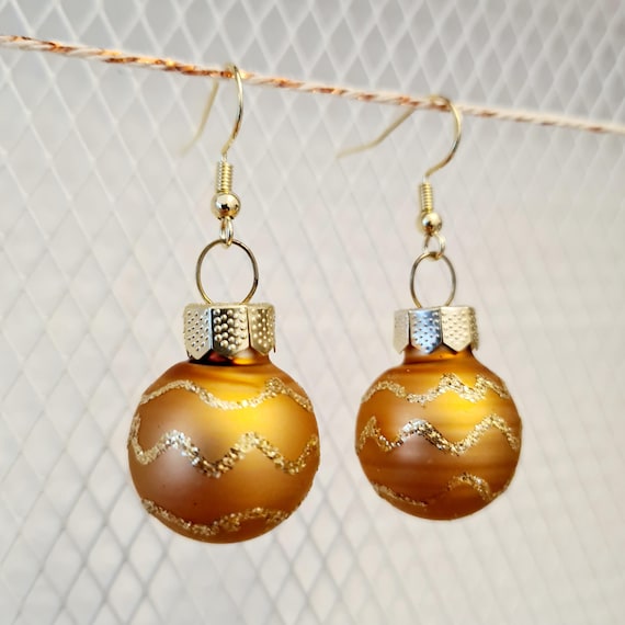 Christmas earrings with beige baubles and glitter :)