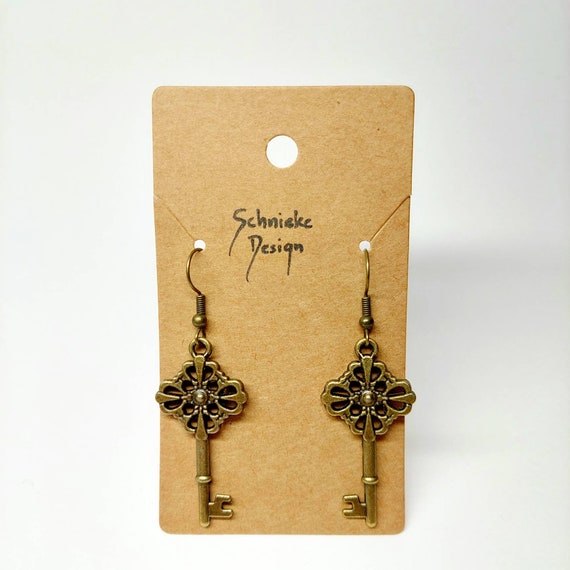 Earrings with keys in antique bronze